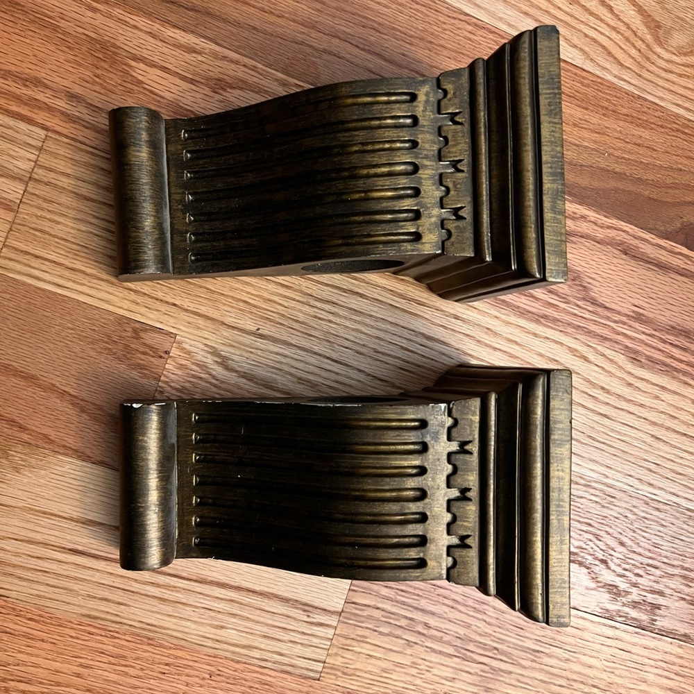 Antique look sconces or drapery rod holders. Wall Corbels